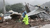 Over 20 dead and 10 missing as landslides, flood sweep homes in South Korea