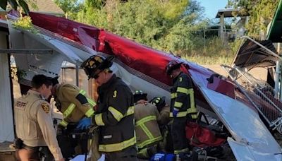 Residents unharmed after small plane crashes into Arizona home, hospitalizing pilot