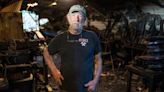 Fire destroyed this much-loved shop in Lawrence. But the owner is tough as a boot