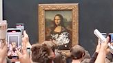 The Mona Lisa was attacked with a pastry by a man disguised as an elderly woman in a wheelchair