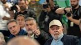 Brazilian President Luiz Inacio Lula da Silva (in hat) promised 'there will be no lack of human or material resources' to deal with the emergency