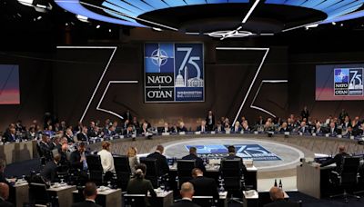 China says it will never accept 'unfounded accusations' at NATO summit