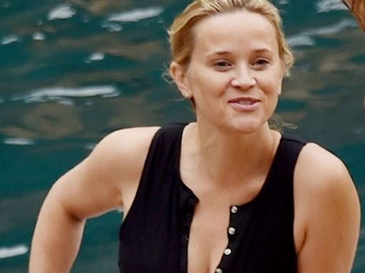 Reese Witherspoon, 48, showcases her cleavage in low-cut bathing suit