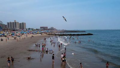 Teenagers die after beach swim in storm as man who tried to help still missing