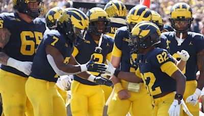 University of Michigan football program penalized for Covid-era recruiting violations, NCAA says