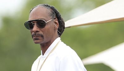 Snoop Dog aprende a nadar con Michael Phelps