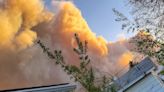 Thousands flee as wildfire threatens Fort Nelson, B.C. sets up emergency supports