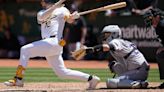A's hit 2 tying homers in late innings and score 5 runs in 11th to rally past Rockies 10-9
