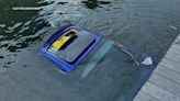 Car submerges in water at Islip Marina