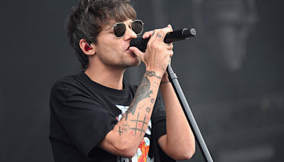 Louis Tomlinson Brings TV to Glastonbury After Festival Organizers Decline to Screen the England Soccer Match