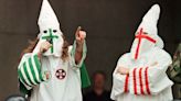 Teacher who allowed student to wear KKK costume banned from school