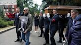 Gorbachev buried in Moscow in funeral snubbed by Putin