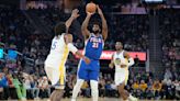 76ers star Joel Embiid limps off court after awkward leg injury in loss to Warriors