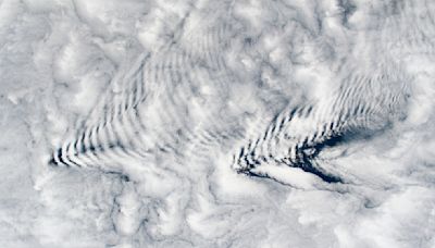 Earth from space: Gravity waves spark pair of perfect cloud ripples above uninhabited islands