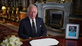 King Charles III delivered his 1st speech as monarch with a photo of his late mother by his side