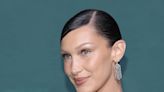 Bella Hadid's Victoria's Secret campaign sparks debate online as some users slam the brand for 'perpetuating body dysmorphia' while others say that 'skinny people exist too'