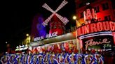 Moulin Rouge windmill restored after collapse - in time for Olympics