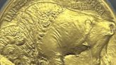 Delighted charity workers found a solid gold American Buffalo coin worth $1,800, discovered in a collection can in Scotland