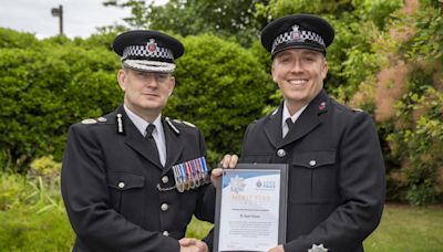 Officer receives highest honour for breaking girl's fall in A12 incident