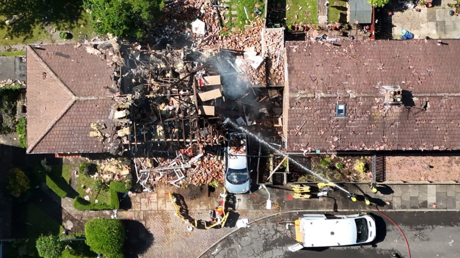 Neighbours pull man from rubble after explosion