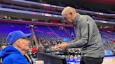 How a 95-year-old Pistons fan got a long overdue courtside surprise: 'He was all smiles'