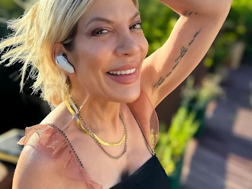 Tori Spelling Reveals She Replaced Her "Disgusting" Teeth With New Veneers - E! Online