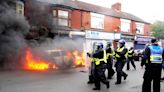 UK riots: Boy who threw paving slab arrives in court with mum and man admits carrying metal pole as a weapon as rioters plead guilty