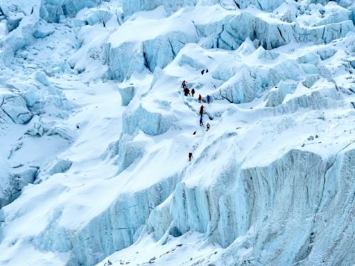 Record number of climbers chase 14-peak dream in Tibet