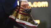 Trump launches sneaker line; gold high-top sneaker sells out in hours