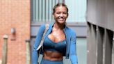 Love Island's Molly Smith flashes her abs after gym session