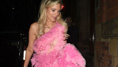 Braless Helen Flanagan risks wardrobe malfunction in striking pink dress