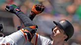Yaz homers twice, Webb, Giants hold off A's 6-4