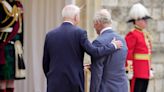 Palace insists King Charles didn’t mind when President Biden ‘broke protocol’ and patted him on back