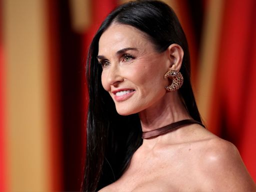 The Neckline of Demi Moore's White Bodycon Dress Doubled as a Statement Necklace