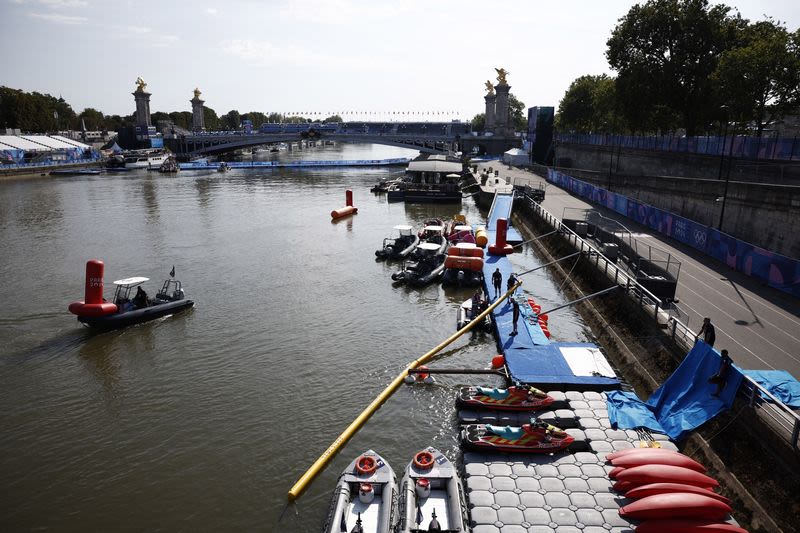 Olympics-Triathlon-Men's race postponed to Wednesday due to Seine pollution levels