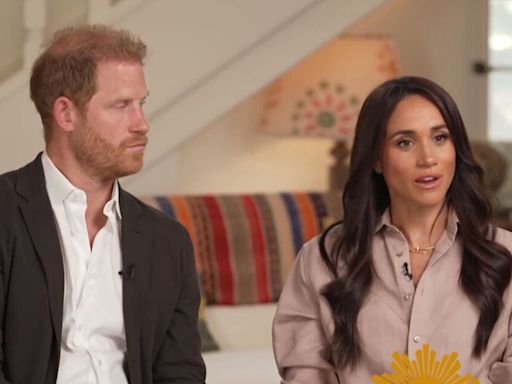 Meghan Markle's mask slips as she gives Harry 'signal' to show she's in control