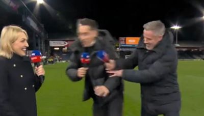 Carragher shoves Neville live on TV in revenge for showing off man-marking style