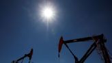 Oil prices ease on strong dollar, mixed global economic news By Reuters