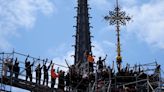 Notre Dame cathedral cross reinstalled in Paris amid restoration efforts