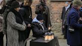 Survivors remember the victims of the Nazi death camps at Auschwitz