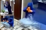 Shocking video shows masked crooks use sledgehammers in brazen smash-and-grab at ritzy Connecticut jewelry store