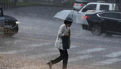 South Korea monsoon rains spur evacuations, disrupt flights