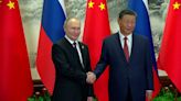 Vladimir Putin arrives in China to meet Xi Jinping as West watches with growing concern
