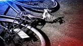 Truck hits cyclist pulling 4-year-old in tow-behind cart, killing child