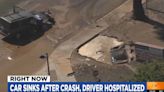 Critical Crash Sees Car Plunge Into Arizona Sinkhole