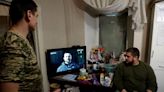 Defiant Ukrainians cheer New Year as drones blasted from skies