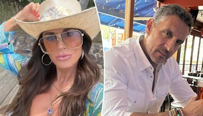 Kyle Richards flaunts her figure in a bikini after ex Mauricio Umansky was spotted kissing another woman