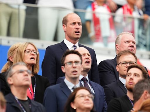 Prince William laughs with One Direction star and European king as he cheers on England team