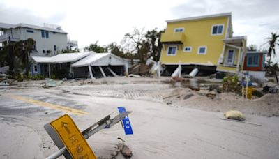 The Latest: Residents begin repairing damage from Hurricane Milton, which killed at least 9