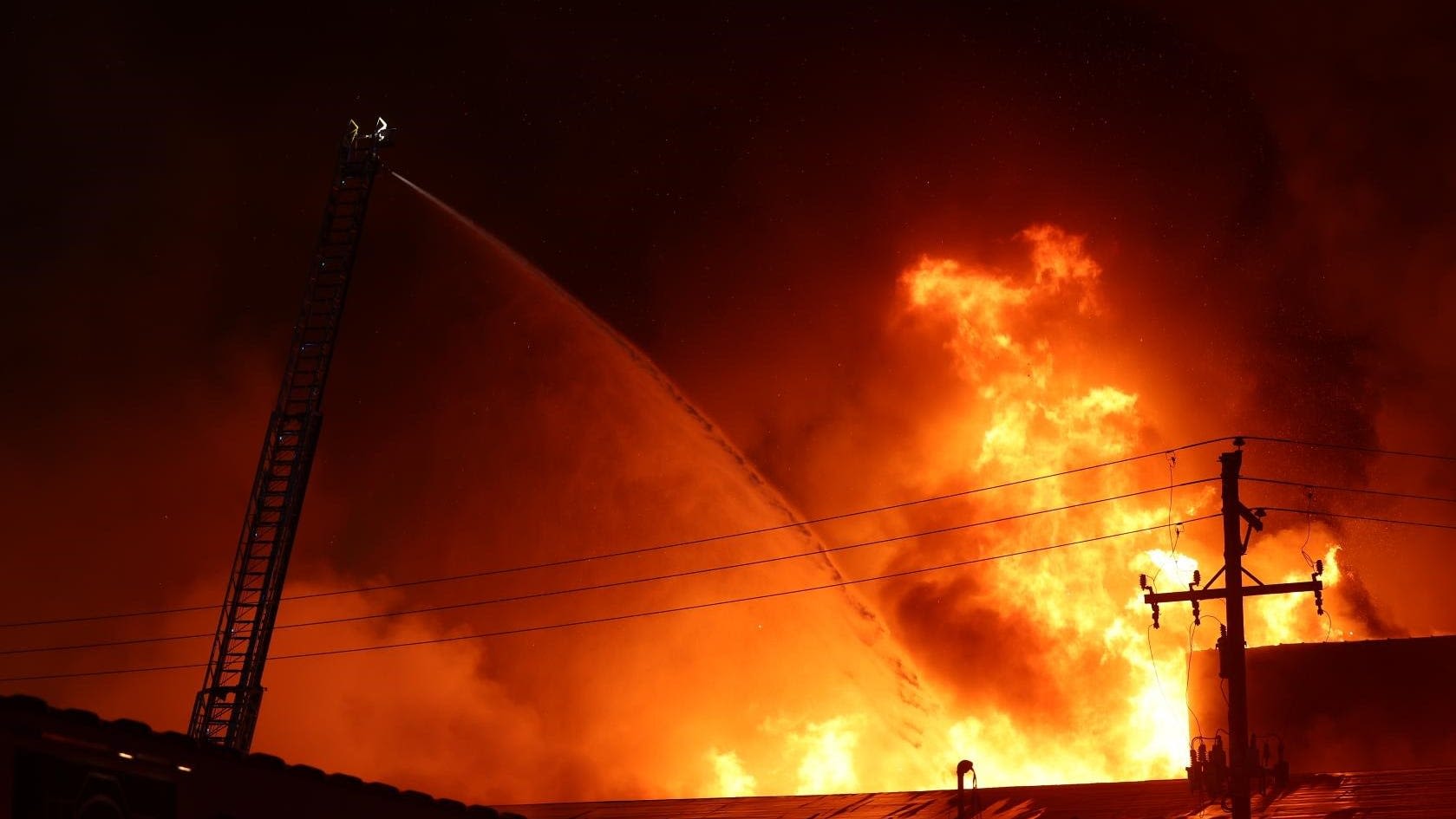 Huge warehouse blaze in York under control - firefighters now putting out hot spots